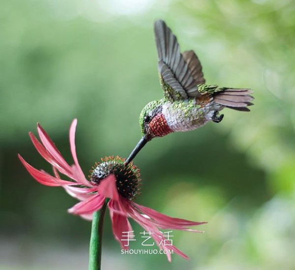 Realistic paper bird sculpture that looks like a photo