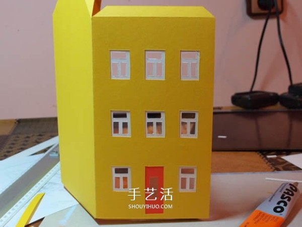 Handmade Christmas house model decoration from cardboard