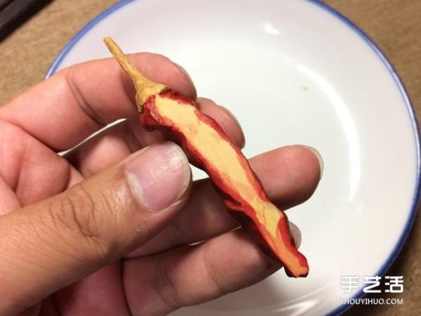 Its so similar! A small wooden carving of dried fish that accidentally broke its teeth