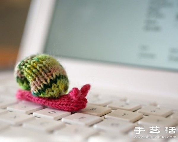 Super cute snail knitted with wool