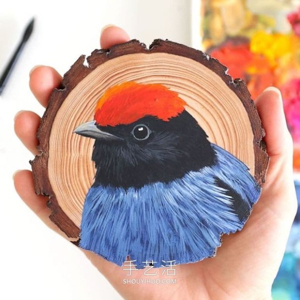 The artist spent 100 days painting 100 species of birds on wood chips