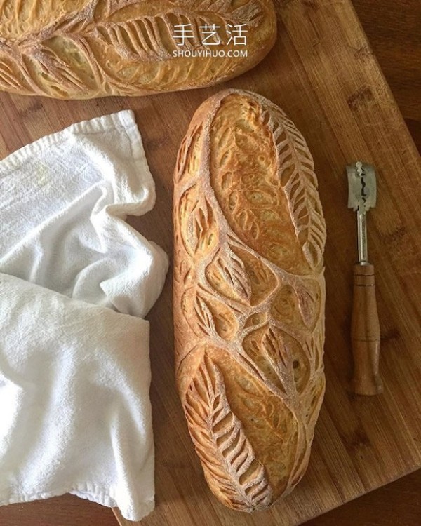 She carved exquisite designs into the bread she made by herself