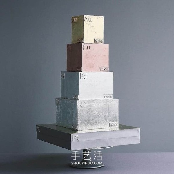 Towering creative cake that looks like an avant-garde sculpture in a museum