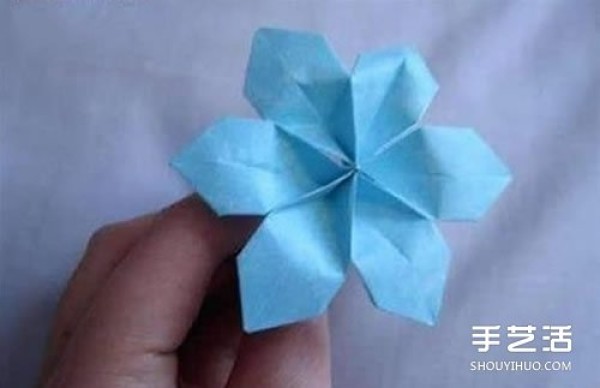 How to make a simple paper flower with an illustrated tutorial on origami with six petals