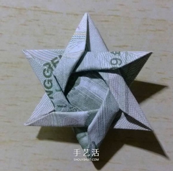 One-yuan banknote origami six-pointed star complex banknote six-pointed star folding method