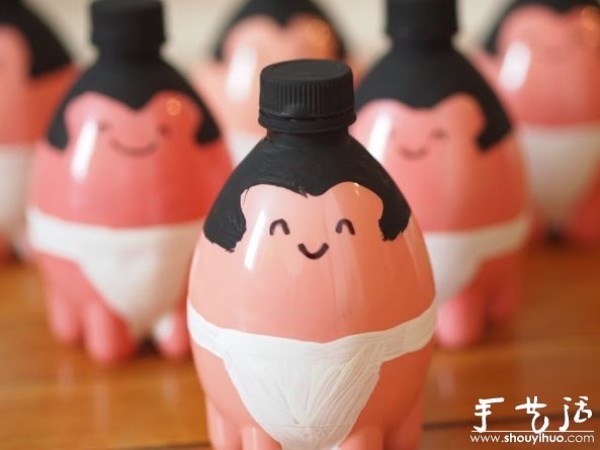 Drink bottles/plastic bottles with hand-painted sumo wrestlers playing homemade bowling