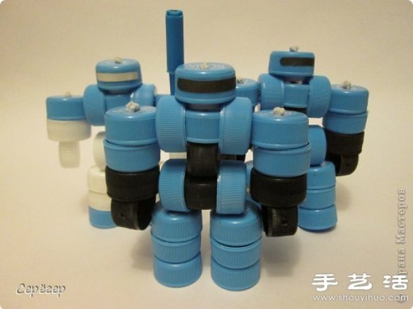 Plastic bottle caps are turned into treasures to make handmade RoboCop toys