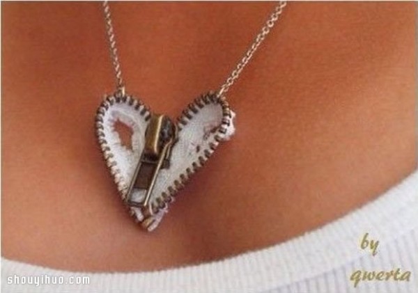 A broken zipper is turned into a treasure, a handmade personalized love necklace pendant