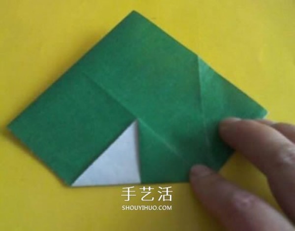 The folding method of rice dumplings is simple and illustrated. How to fold paper rice dumplings.Tutorial