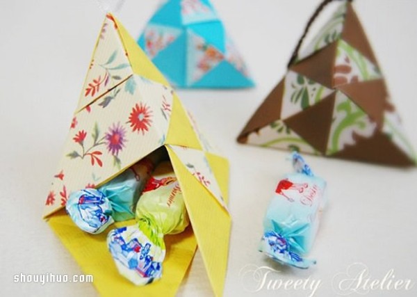 Illustrations of folding origami three-dimensional rhombuses for use as packaging boxes or pendants