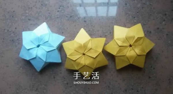 How to fold beautiful paper flowers, step-by-step illustration of hand-made origami six-pointed star flower