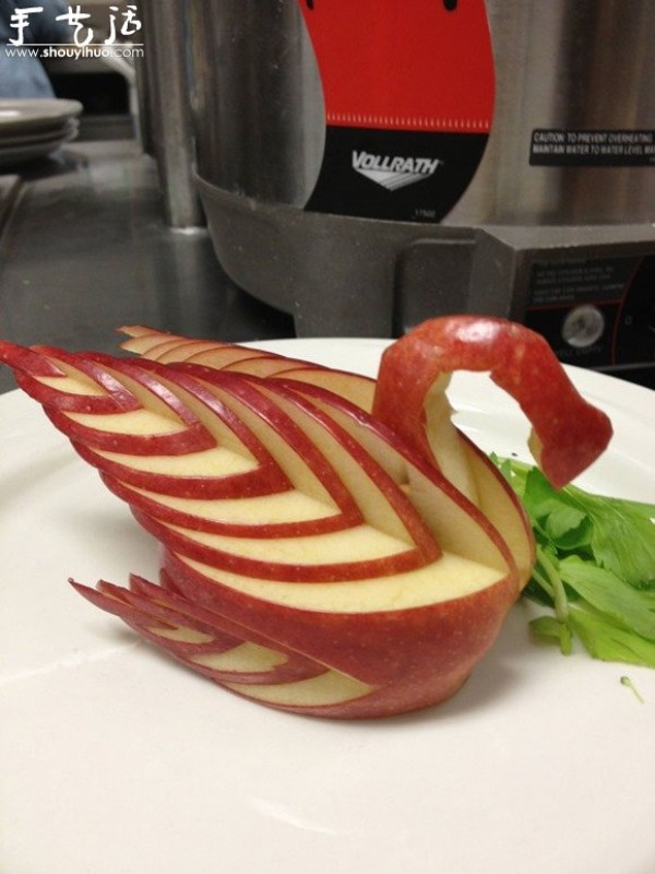 Swan carved from apple