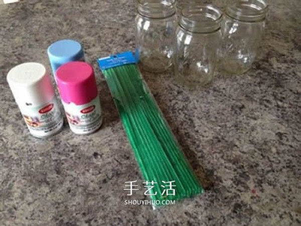 A thoughtful Mothers Day gift to use a glass bottle and cardboard to make palm flowers