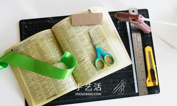 Tutorial on how to make a DIY note holder by transforming an old phone book into a note holder and a flower bush note holder