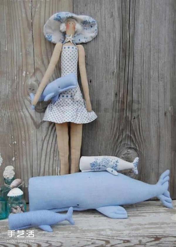 Tutorial on homemade fabric girl dolls with drawings of a girl rushing to the sea in non-woven fabrics