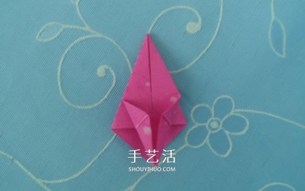 Childrens origami peach tutorial with simple instructions on how to fold a peach