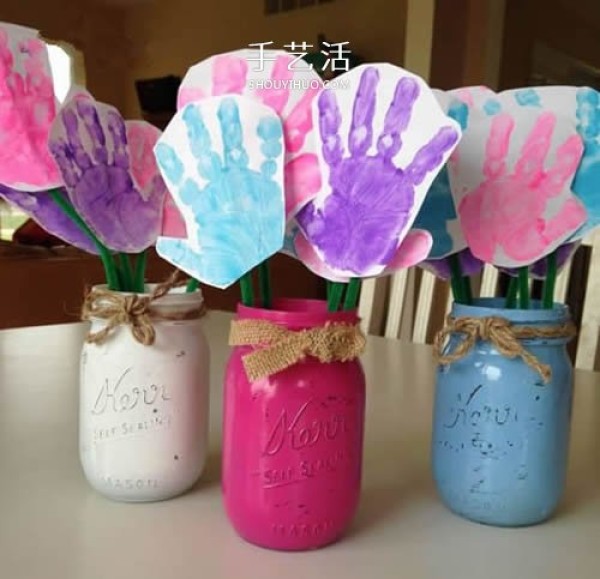 A thoughtful Mothers Day gift to use a glass bottle and cardboard to make palm flowers