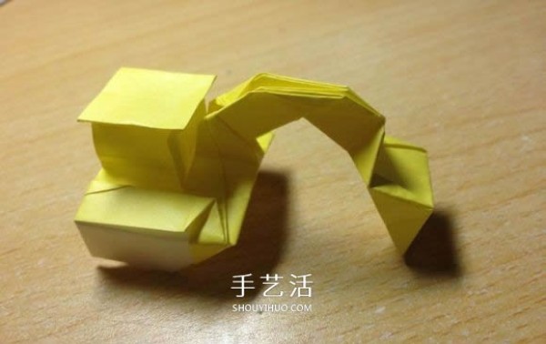 The origami method of an excavator illustrates the folding process of a manual excavator