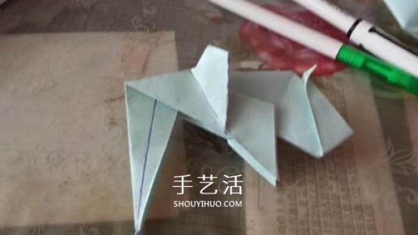 How to fold a three-dimensional elephant with diagrams and instructions for folding origami and a standing elephant