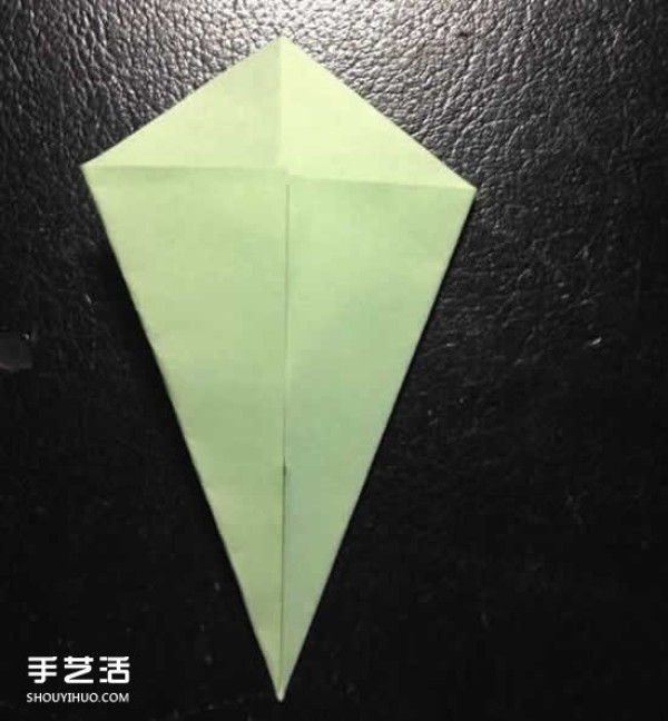 How to fold a four-petaled flower with illustrated steps. How to make an origami four-petaled flower by hand