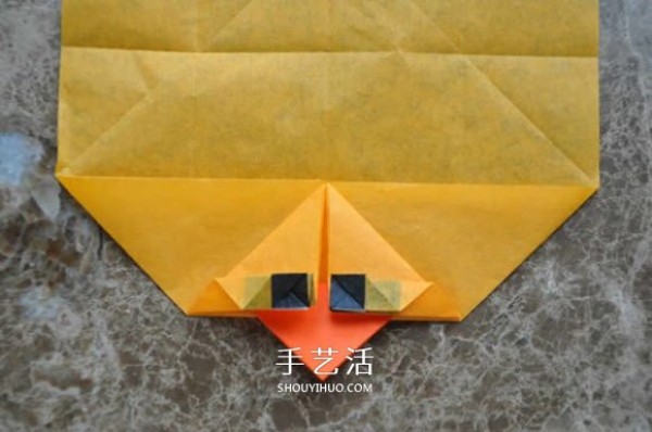 Steps of hand-made origami big yellow duck yellow.Illustration of how to fold a duck