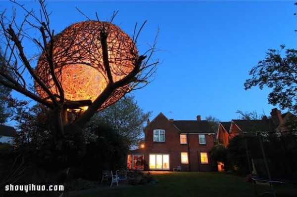 Beautiful birds nest-shaped willow treehouse on the withered cherry tree