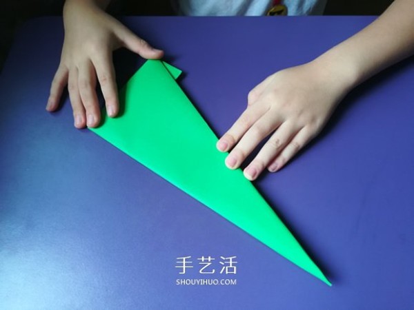 An eight-year-old boys origami sharing an illustrated tutorial on an origami fighter jet