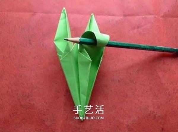 Hand-folding lilies illustrates the steps of folding a simple paper lily