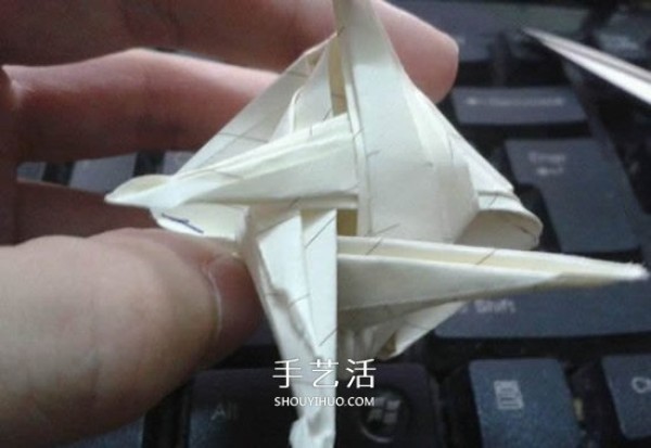 Tutorial on how to fold pearlescent conch, step by step diagram of origami conch