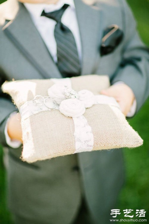 Handmade linen ring pillows commonly seen in forest weddings