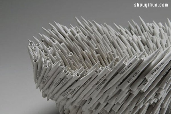 Heating and baking soft old books into paper sculptures