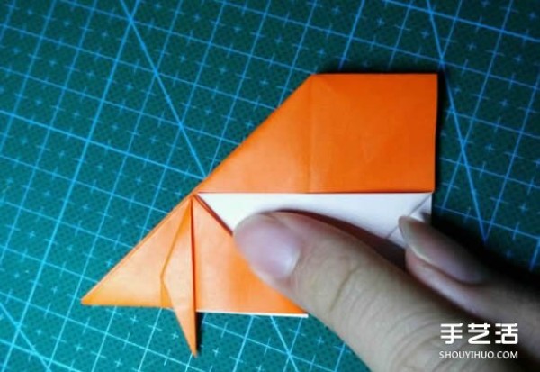 How to make an origami kingfisher with detailed instructions on how to fold a kingfisher