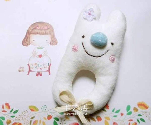 How to make a bunny hand rattle with illustrations of making a fabric cartoon hand rattle