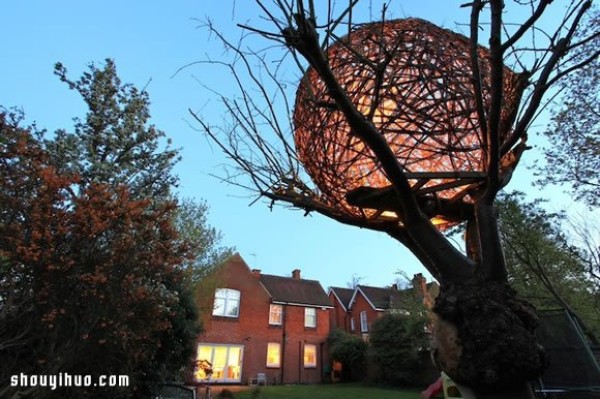 Beautiful birds nest-shaped willow treehouse on the withered cherry tree