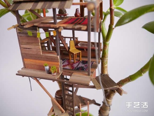 DIY exquisite treehouse model on a potted plant, a Lilliputian-like miniature building