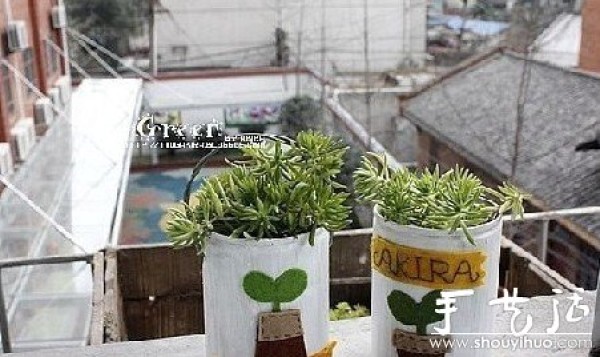 Handmade DIY flower pots from small tin cans