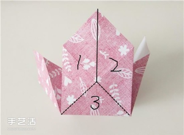 Illustration of the origami method of playing cards diamonds and hearts