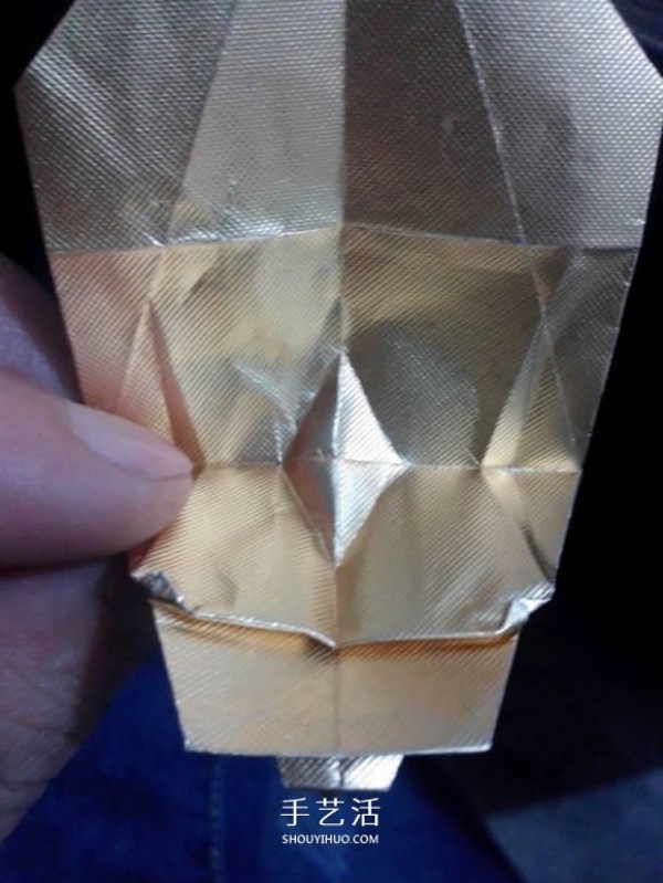 Illustrated steps of making handmade origami three-dimensional owl using cigarette box paper waste