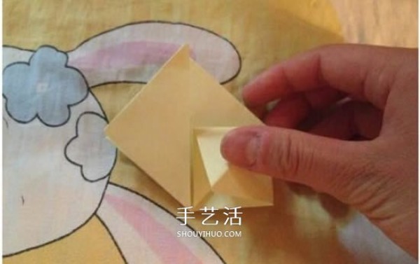 Four-petaled flower origami illustrated tutorial how to fold a four-petaled flower by hand