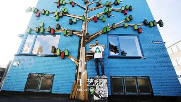 Recycle wood to create a colorful birdhouse for birds to find a place to live