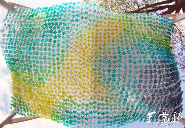 Car awning made from discarded beverage bottles