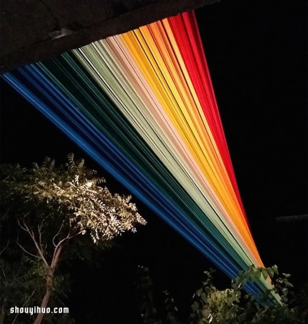 Look up and see a rainbow, a beautiful corner created by 150 colorful ribbons