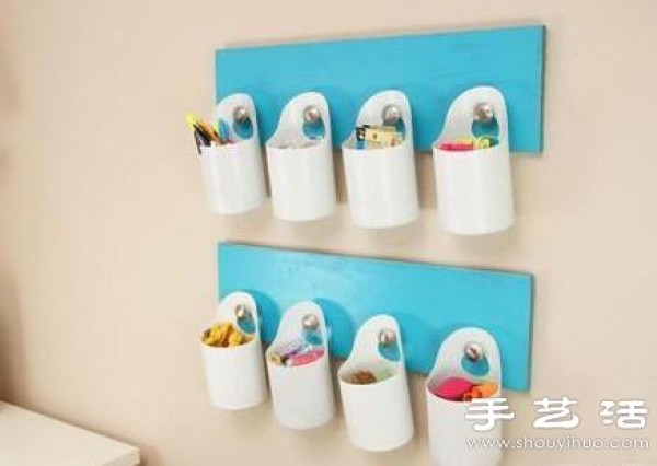 Plastic bottles + wooden board waste are used to make handmade storage wall hangings