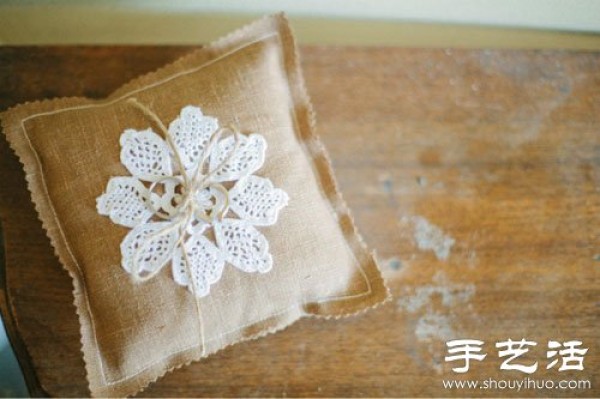 Handmade linen ring pillows commonly seen in forest weddings