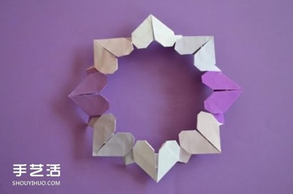 Love garland origami step-by-step illustration to make a beautiful garland with origami hearts