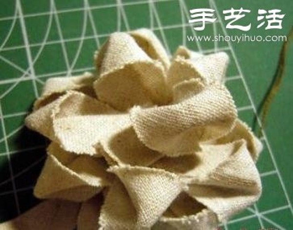 Handmade forest-style fabric flowers made from cloth strips + cardboard