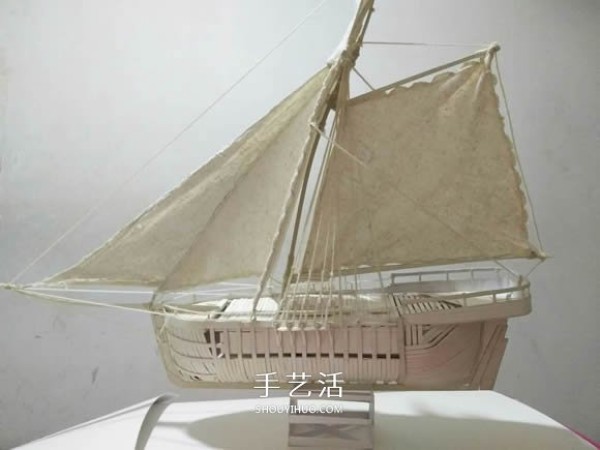 Paper sloop model is made of exquisite cardboard sailboat, handmade