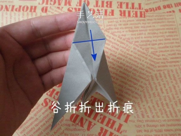 Illustrations of how to fold a cute puppy. Step-by-step pictures of origami puppies.