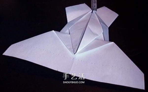 A detailed illustration of how to fold an Avengers paper plane or an origami fighter plane