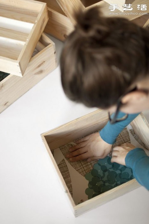 Abandoned drawers are simply transformed into handmade hanging storage cabinets